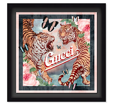 Wall art of wo tigers roaring, with flowers and butterflies, and an italian fashion brand logo